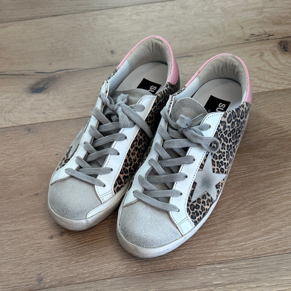 Golden Goose super-star Leopard Print Sneakers with Pink and Gray Accents.